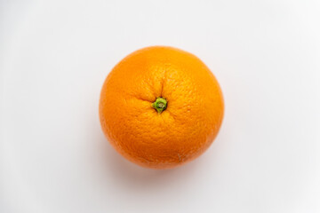fresh and juicy orange fruit on white background, view from above