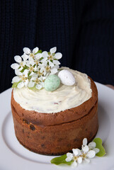 Delightful homemade Easter cake adorned with spring blossoms and festive Easter eggs, perfect for celebrating season of renewal and joy with loved ones during springtime gatherings and festivities