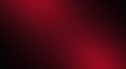 Soft gradient of deep red and black tones creating a smooth and elegant abstract blurred backdrop