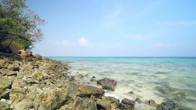 blue sea from another view of koh thale waek archipelago tub islands ko more and chicken island at Krabi in Thailand with rocks stones tree on beach for summer holiday travel to nature ocean marine