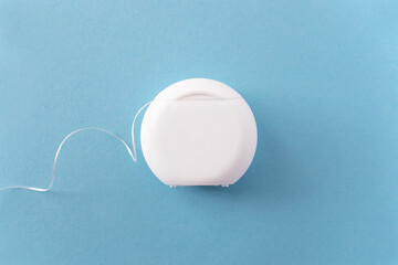 Teeths Flossing. Oral hygiene and health care. Dental floss for white healthy teeth.