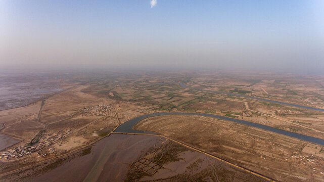 Aerial view of beautiful mangroves and river in a serene landscape, Keti Bander, Sindh, Pakistan.