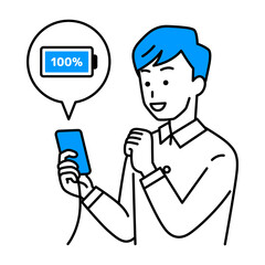 スマートフォンを充電するカジュアルな男性