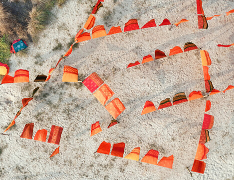Aerial view of vibrant batik fabrics drying with colorful patterns, Dhaka, Dhaka, Bangladesh.