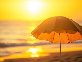 Umbrella on beach against yellow sun with serene mood and warm lighting