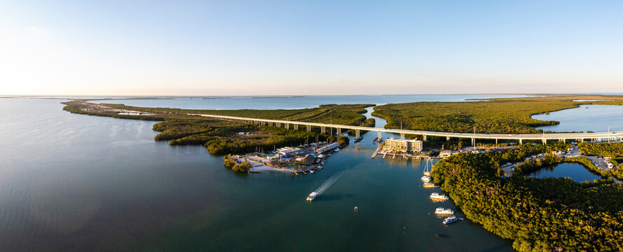 Aerial view of blackwater sound with serene mangroves and a bridge, Key Largo, Florida, United States.