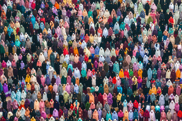Bogura, Bangladesh - 11 April 2024: Aerial view of women gathered for Eid prayer in a vibrant celebration, Bogura, Rajshahi, Bangladesh.