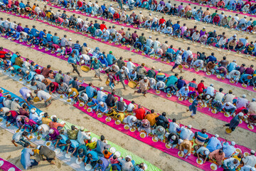 Bogura, Bangladesh - 12 February 2021: Aerial view of a vibrant majlis public food offering with a large crowd celebrating in unity, Sekherkola, Bogura, Rajshahi, Bangladesh.