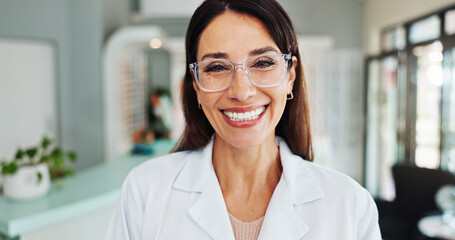 Happy woman, portrait or glasses with sight for eyecare, optical or vision at optometry store. Female person, optometrist or face with smile, spectacles or eye prescription for small business at shop