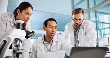Fototapeta premium Team, scientist and laptop in laboratory for medical innovation, research and analysis on clipboard. Science discussion, people and computer for healthcare study, planning and medicine development