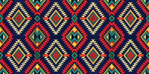 Vibrant geometric pattern featuring colorful diamond designs on a dark background.