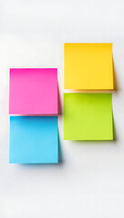 Fototapeta premium Portrait Four Colorful Sticky Notes on a White Surface