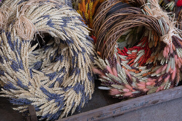 Spring wreath adorned with spikelets and lavender flowers as vibrant Easter decorations showcasing a variety of colors and textures perfect for celebrating the Easter holiday