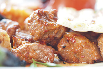 Delicious grilled meat dish served at outdoor dining event