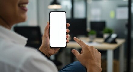 person showing something on their phone with an office background