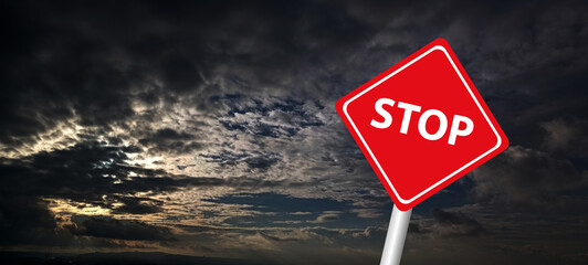 Hurricane Idalia warning sign against a powerful stormy background with copy space. Dirty and angled sign with cyclonic winds add to the drama.hurricane season sign on cloudy background.stop