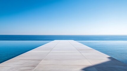 Obraz premium Stunning Infinity Pool Ocean View Luxury Resort Calm Tranquil Serene Blue Water Summer Vacation Paradise Idyllic Seascape Minimalist Architecture 