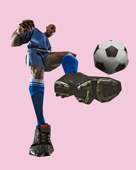 Low angle view of man, soccer player in blue uniform kicking ball mid-air with oversized cleats in...