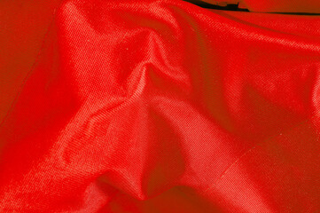 Textura o fondo de tela reflectante roja