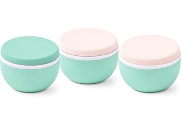 Three mint green and blush pink stackable food storage bowls.