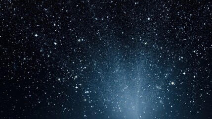 Obraz premium Night sky with stars sparkling on black background.