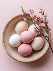 A bowl filled with pink and white Easter eggs, celebrating the festive spirit of the holiday.