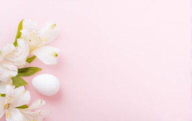 A white egg surrounded by colorful flowers on a soft pink background.