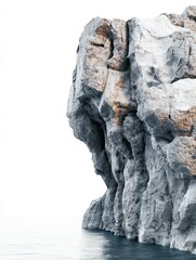 Gray and White Rock Formation Emerging from Dark Blue Water
