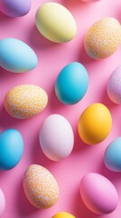 Pastel-colored Easter eggs scattered artfully on a soft pink background, creating a whimsical and festive springtime composition with delicate textures and gentle hues