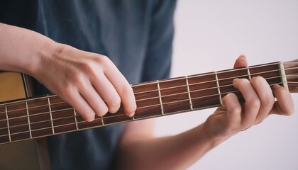 Obraz premium Fingers playing a guitar strings