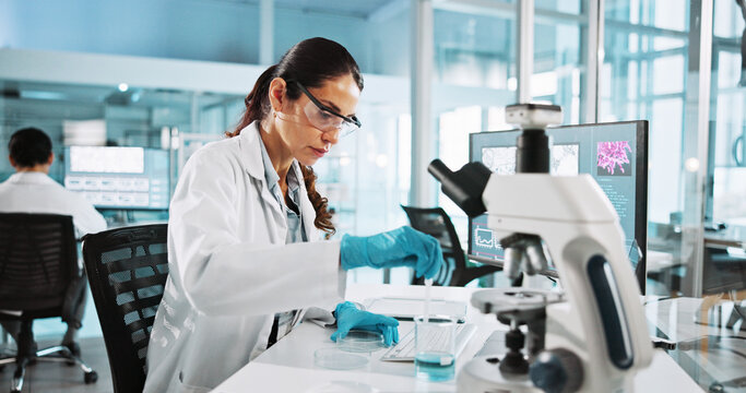 Scientist, woman and research with beaker at lab with sample, liquid and test with pharma career. Person, ppe and equipment with chemical process for medical innovation, vaccine and clinical study