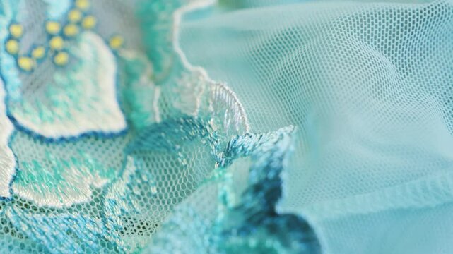 Close-up of green beautiful lace texture fabric. High quality 4k footage