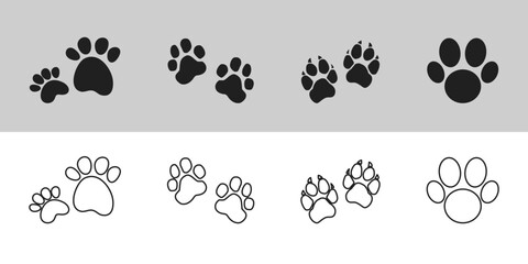 Fototapeta premium Seamless black and white dog paw print pattern, ideal for fashion, textile, and decor. Paw Icon. Paws Icons. Dog, bear and cat paw prints collection. Vector Illustration. Vector Graphic. EPS 10