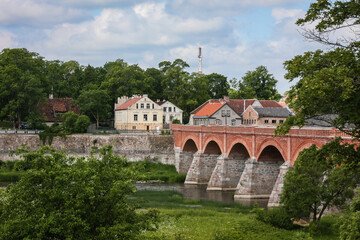 Kuldiga brick bridge over the Venta River. The bridge is the third longest brick bridge in Europe. Next to it is Ventas Rumba, the widest waterfall in Europe.