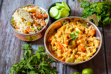 Navratan Pulao is a rich, aromatic Indian rice dish made with basmati rice, mixed vegetables, nuts, and dried fruits, offering a delightful sweet-savory flavor.