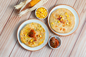 Corn cheese paratha is a delicious Indian flatbread stuffed with spiced sweet corn and melted cheese, perfect for breakfast or snacks.