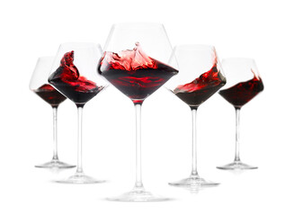 Red wine splashing in glasses on white background, set