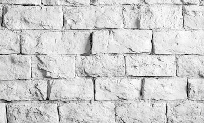 Fototapeta premium A white-painted brick wall with distinct textures and horizontal alignment, giving a clean yet rustic aesthetic.