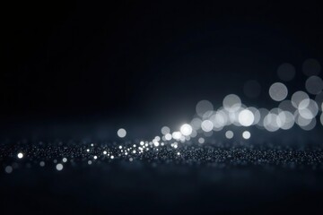 White glittering lights shining on a sleek black background for overlay with ample copy space,  sparkle,  holiday