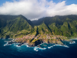 Aerial view of the Seixal village, place on the northern coast of Madeira, Portugal, know for natural pools in the Atlantic Ocean.