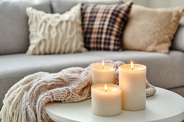 Cozy Interior Still Life with Pillows, Blankets and Burning Candles