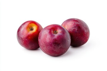 Fototapeta premium Three plums on a white background