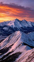 Majestic winter sunrise over snow-capped peaks