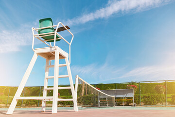 Old chair for umpires or judge on tennis court.  Concept of healthy lifestyle, sports, activity...