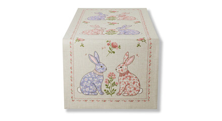 Fabric table runner with printed pastel bunnies in floral patterns, surrounded by roses and decorative stitching. Soft colors and cute design create a charming Easter or springtime theme.