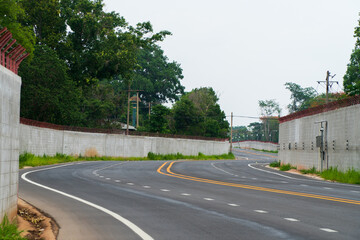 The road is paved with winding curves.