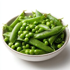 Close up of fresh green peas in a white bowl isolated on white background