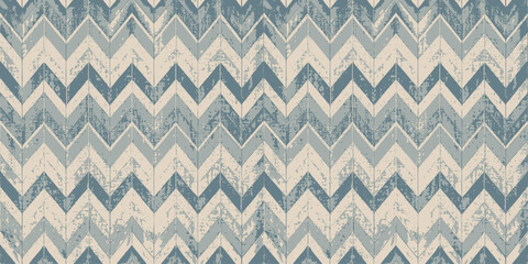 Stylish chevron pattern in soft blue and cream tones.
