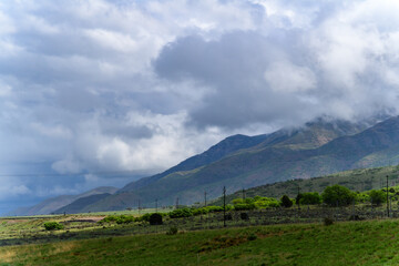 Forested mountains covered with low hanging clouds, USA