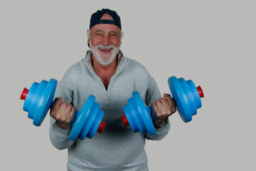 Fit and Full of Life. A senior citizen laughs as he works out with blue dumbbells. A satirical look at fitness in old age, full of charm, self-irony and genuine joy for life.